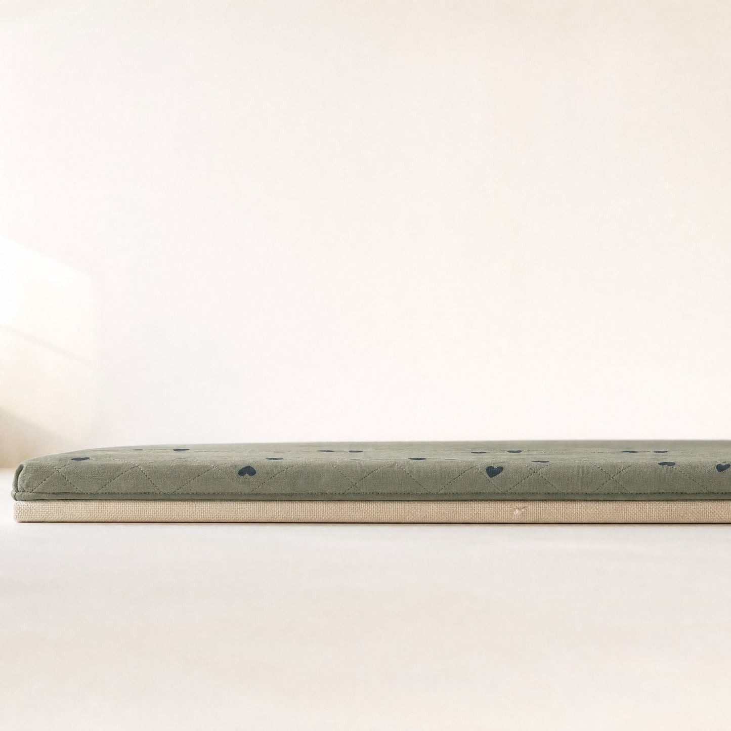 The mat seen at surface level, showing its thin profile