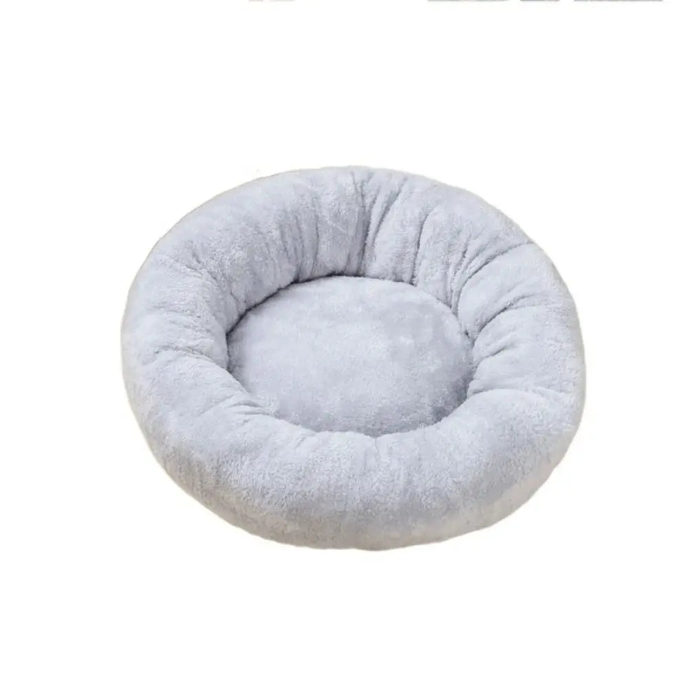 A dark charcoal plush donut dog bed — supplier photograph 9 of 9