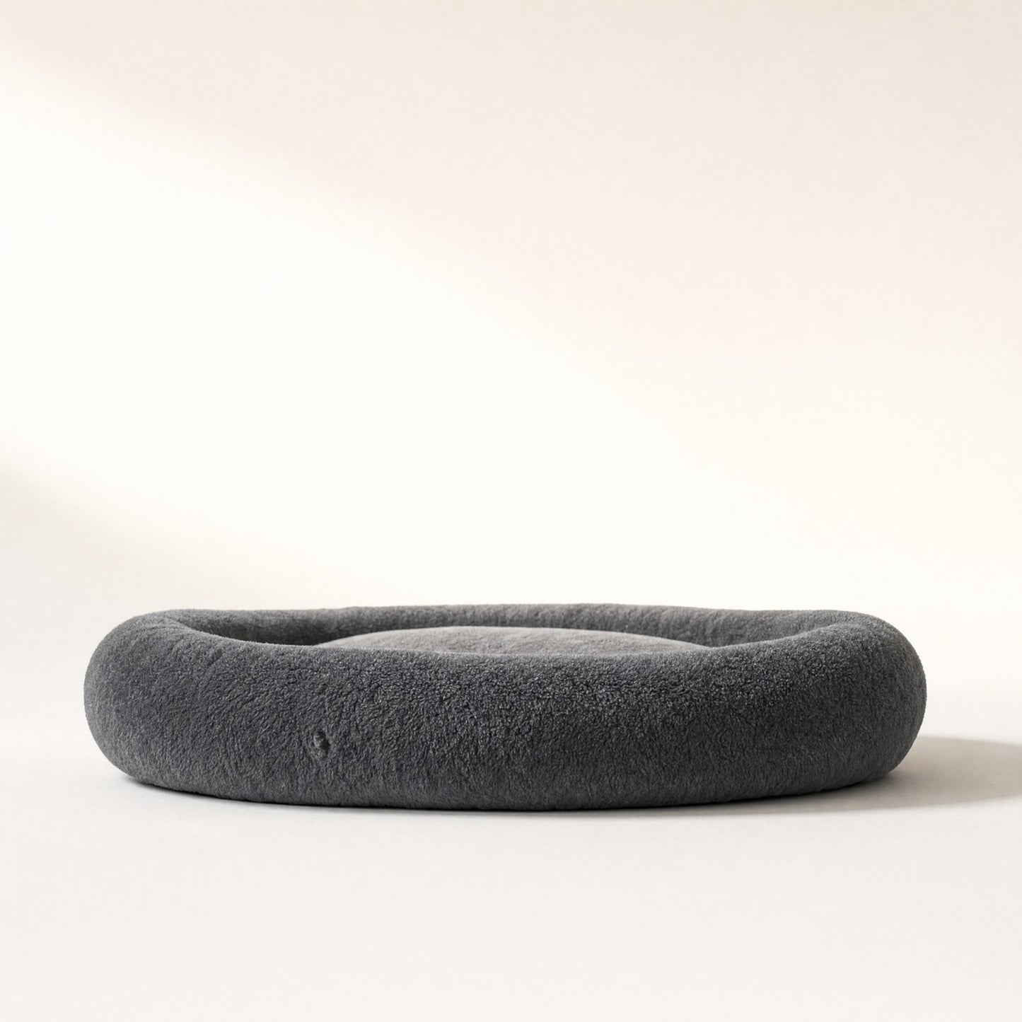 The bed seen at floor level, showing how high the rim sits