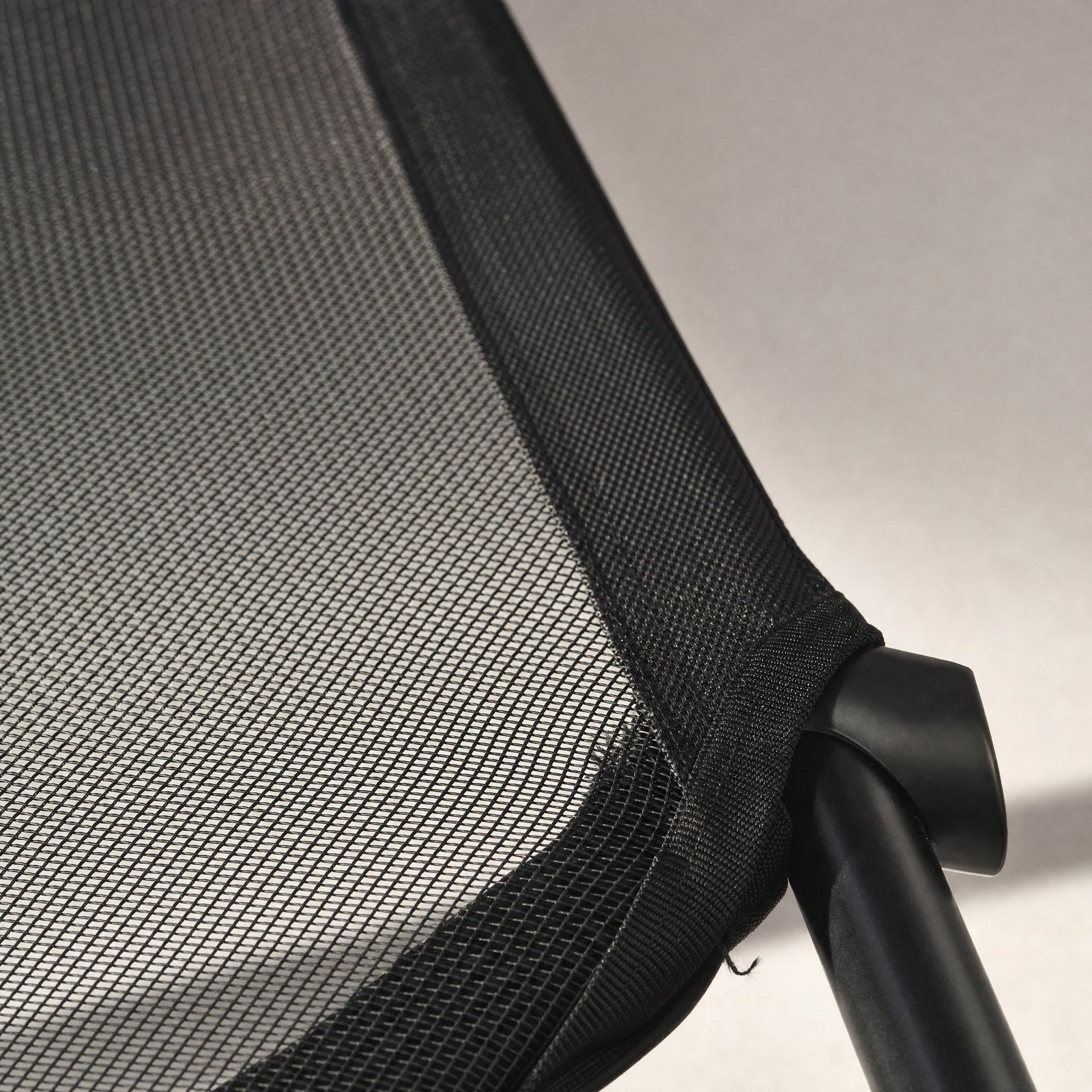 Close-up of the mesh weave and the corner where it meets the frame