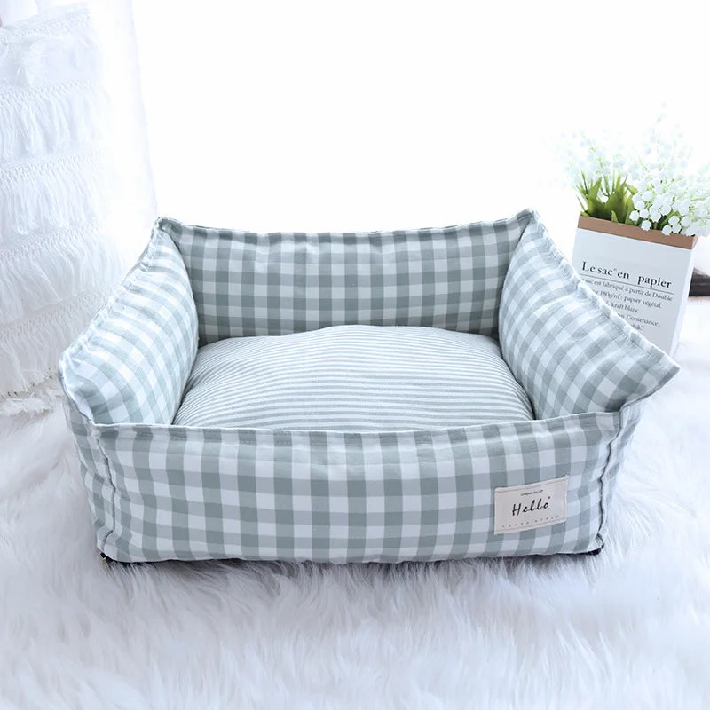 An enclosed dog bed with a hood