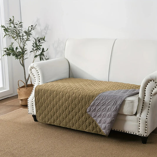 A waterproof quilted sofa dog bed