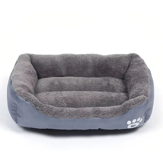 A dog bed with sides on three edges, washable