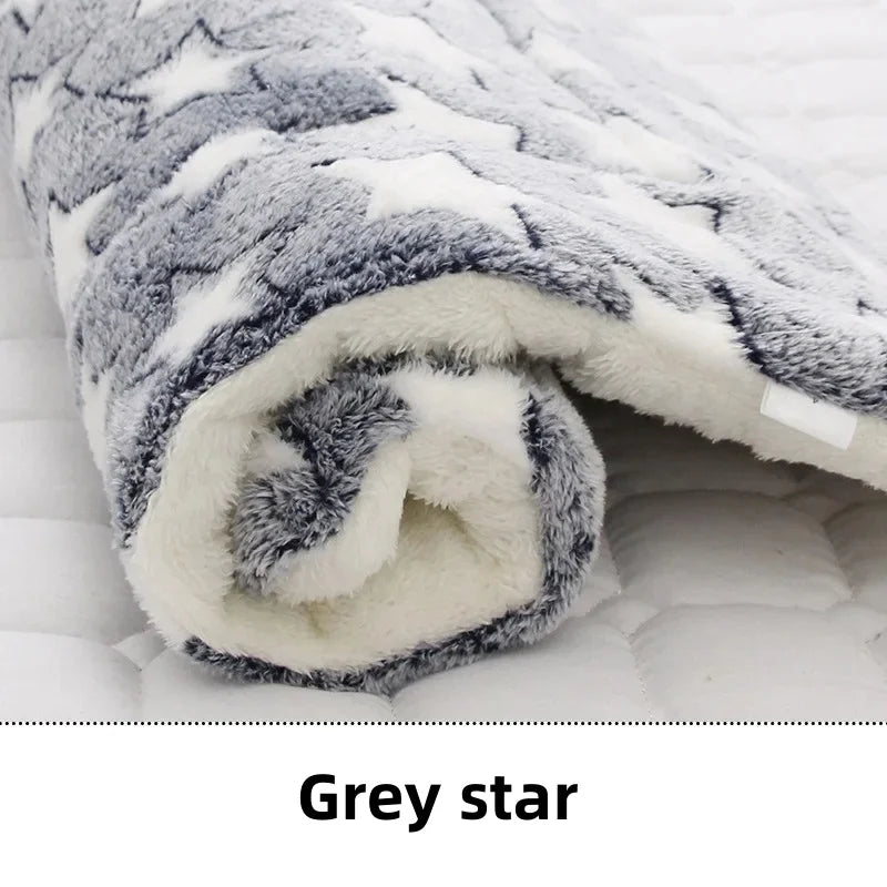 A grey fleece mat for dogs