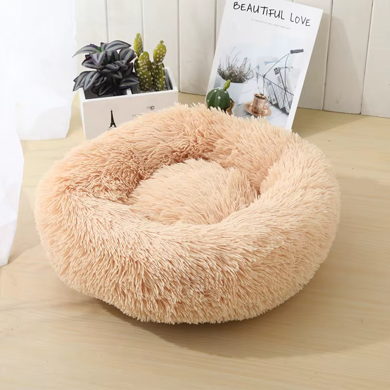 A bright pink plush donut dog bed — supplier photograph 15 of 27