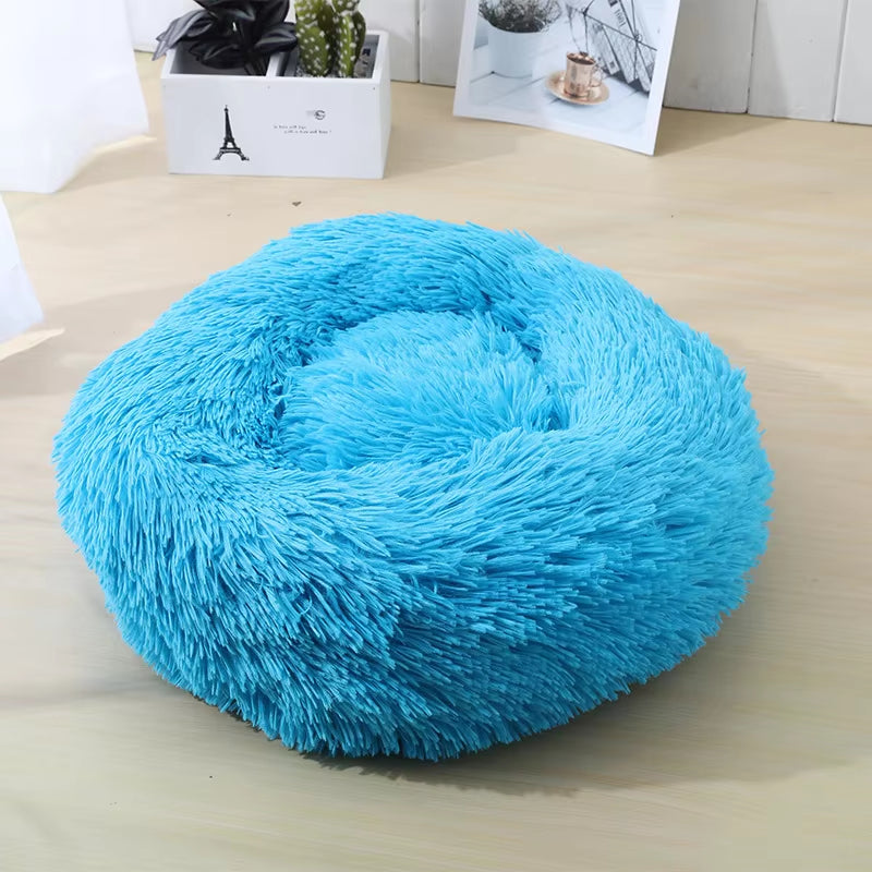 A bright pink plush donut dog bed — supplier photograph 9 of 27