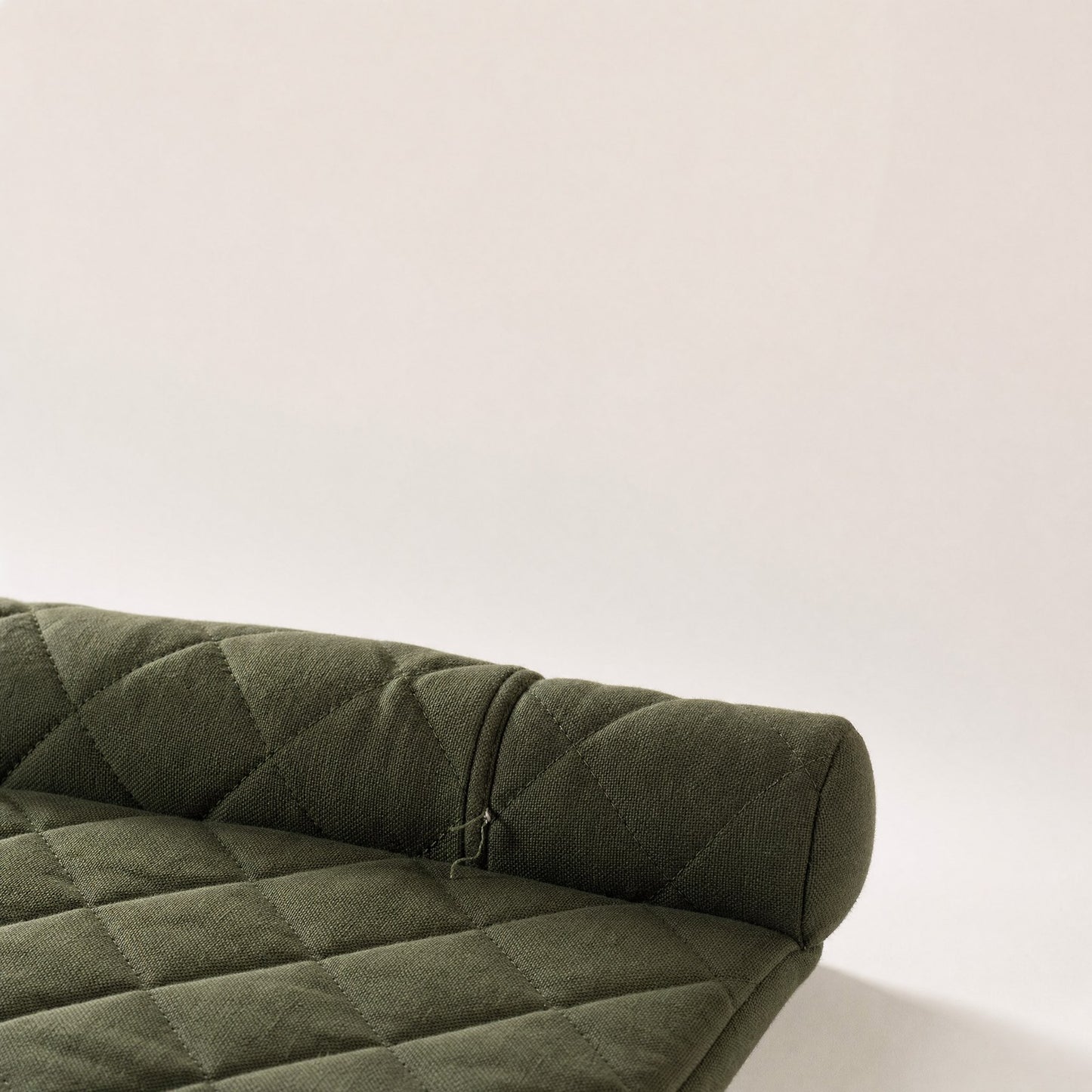 Close-up of the seam where the panel meets the bolster roll