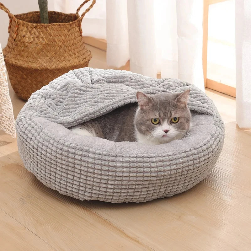 A warming fleece donut dog bed — supplier photograph 2 of 7