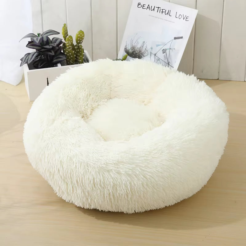 A bright pink plush donut dog bed — supplier photograph 20 of 27