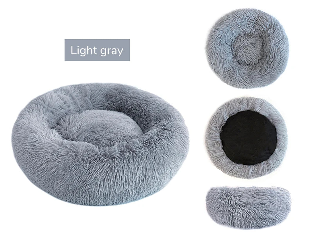 A pure white warming plush donut dog bed — supplier photograph 12 of 15