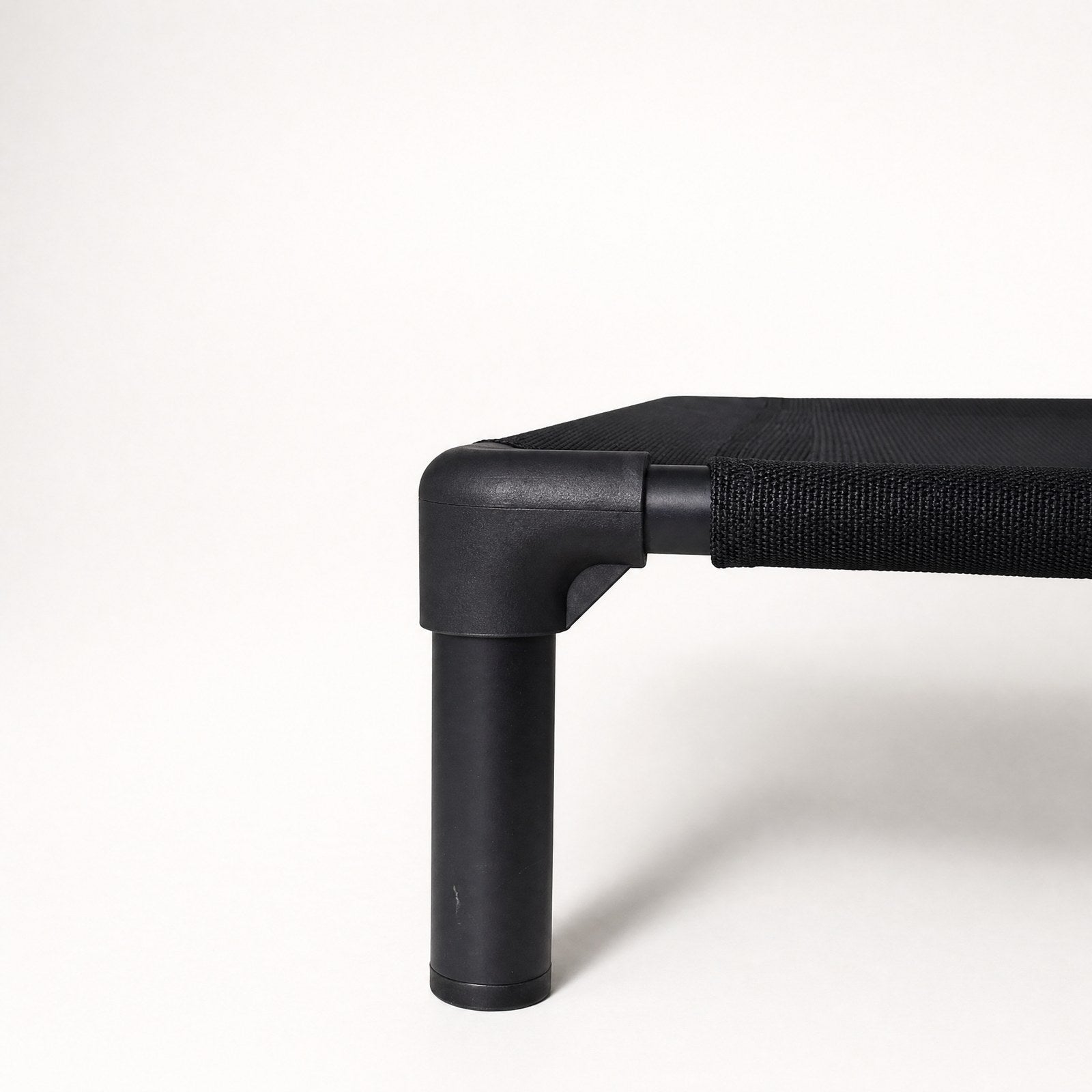 Close-up of the corner joint where the leg meets the frame