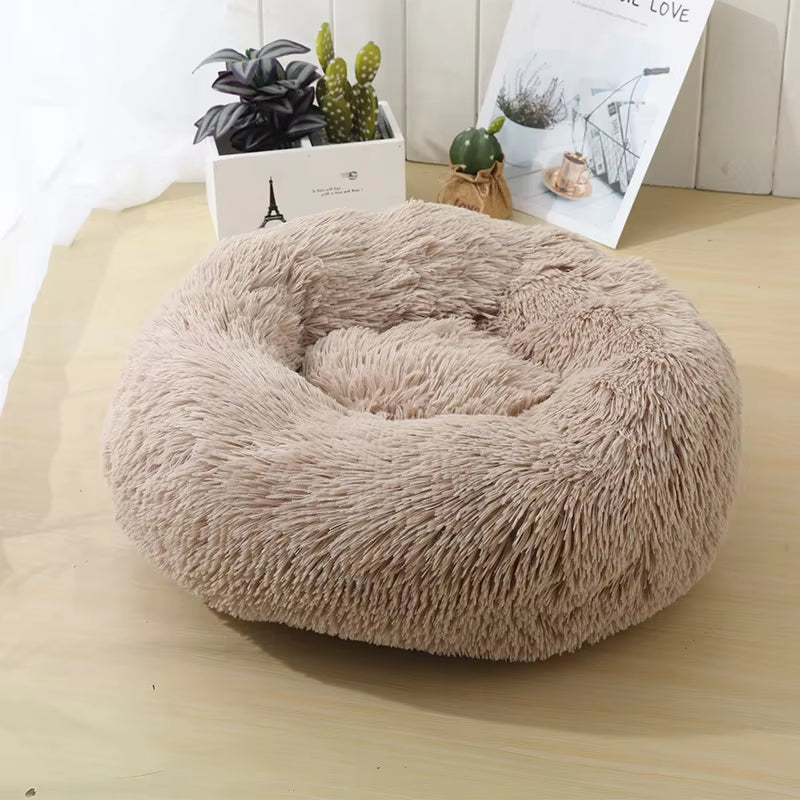 A bright pink plush donut dog bed — supplier photograph 24 of 27