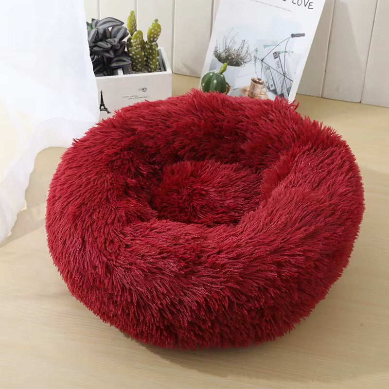 A bright pink plush donut dog bed — supplier photograph 26 of 27