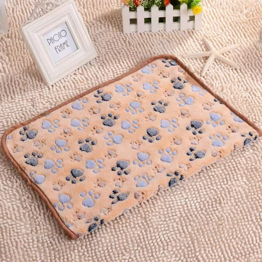 A tan fleece mat for dogs