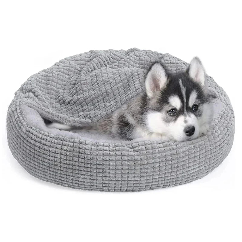 A warming fleece donut dog bed — supplier photograph 3 of 7