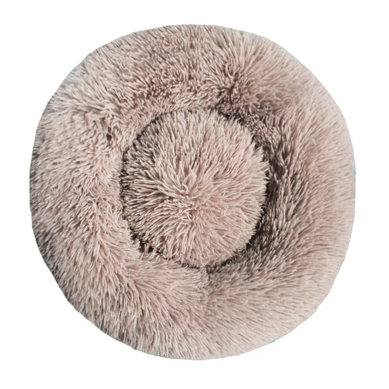 A dusty pink warming plush donut dog bed — supplier photograph 13 of 20