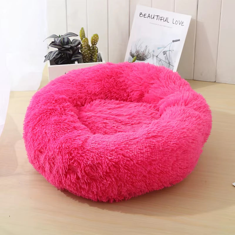 A bright pink plush donut dog bed — supplier photograph 23 of 27