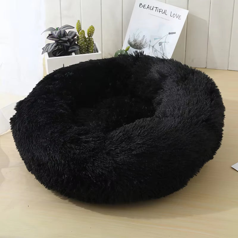 A bright pink plush donut dog bed — supplier photograph 10 of 27