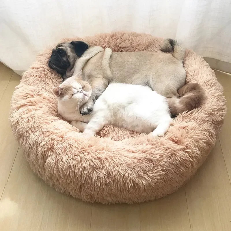 A dusty pink warming plush donut dog bed — supplier photograph 4 of 20