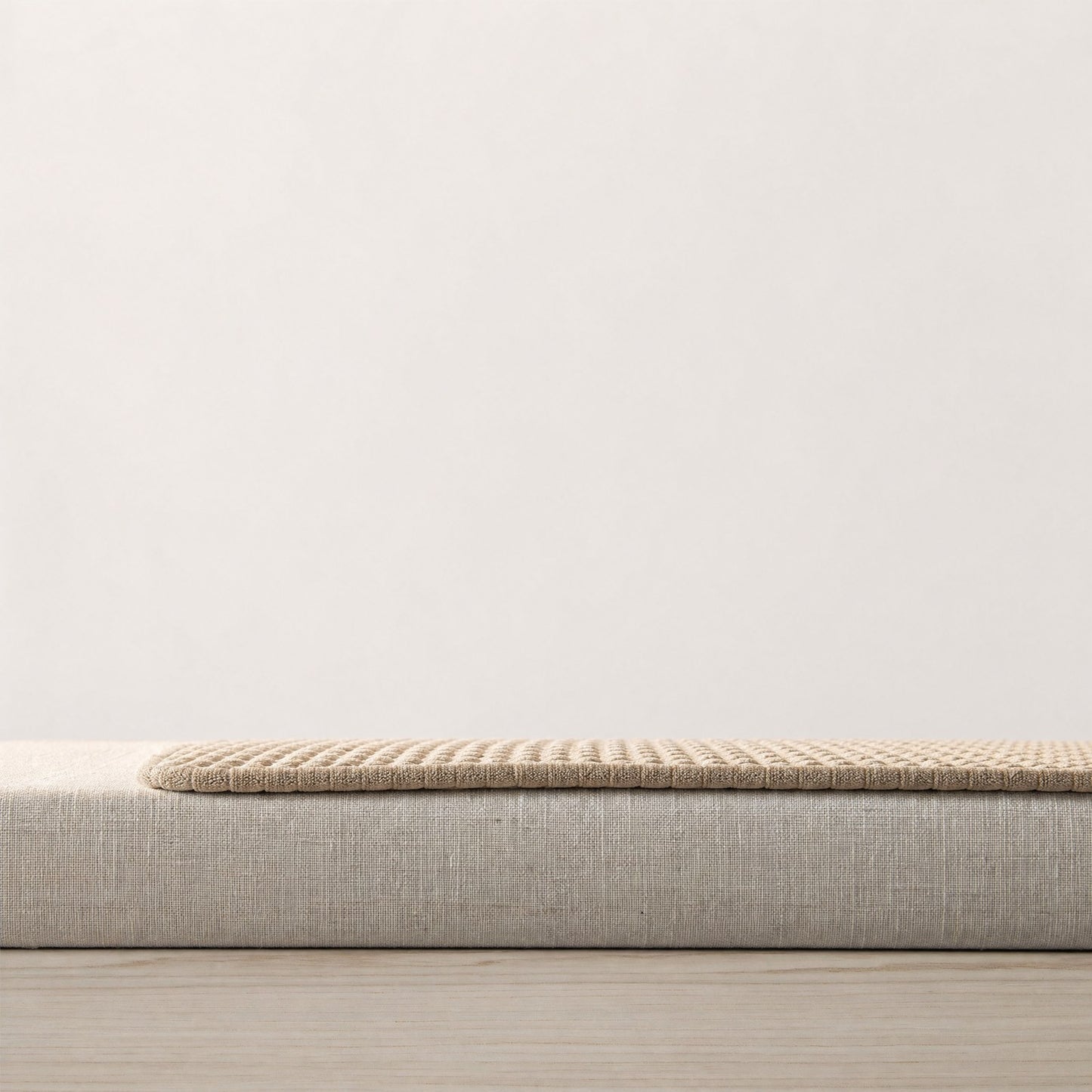The mat seen at surface level, showing its thin profile