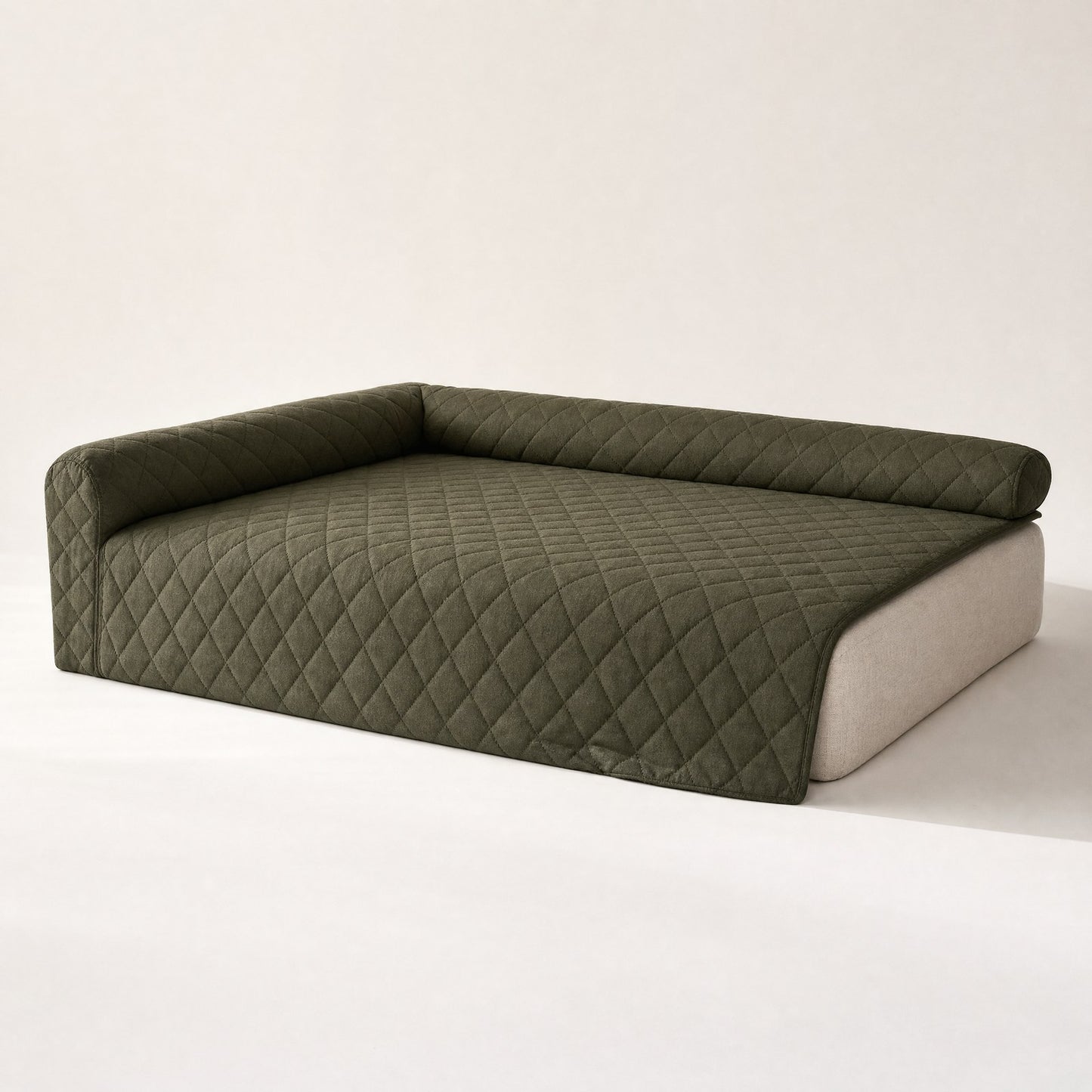 The couch cover seen at an angle, showing its L-shaped bolster