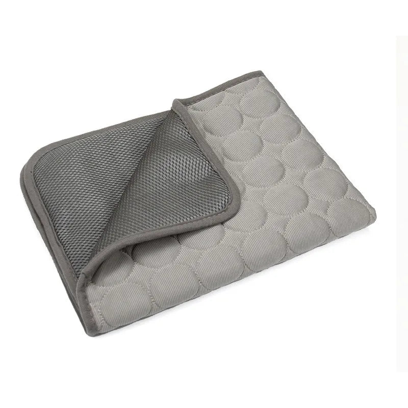 A flat cooling mat for a dog, washable