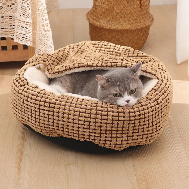 A warming fleece donut dog bed