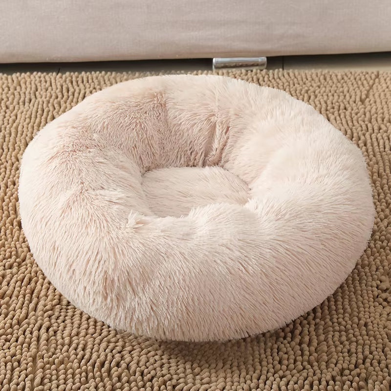 A bright pink plush donut dog bed — supplier photograph 12 of 27