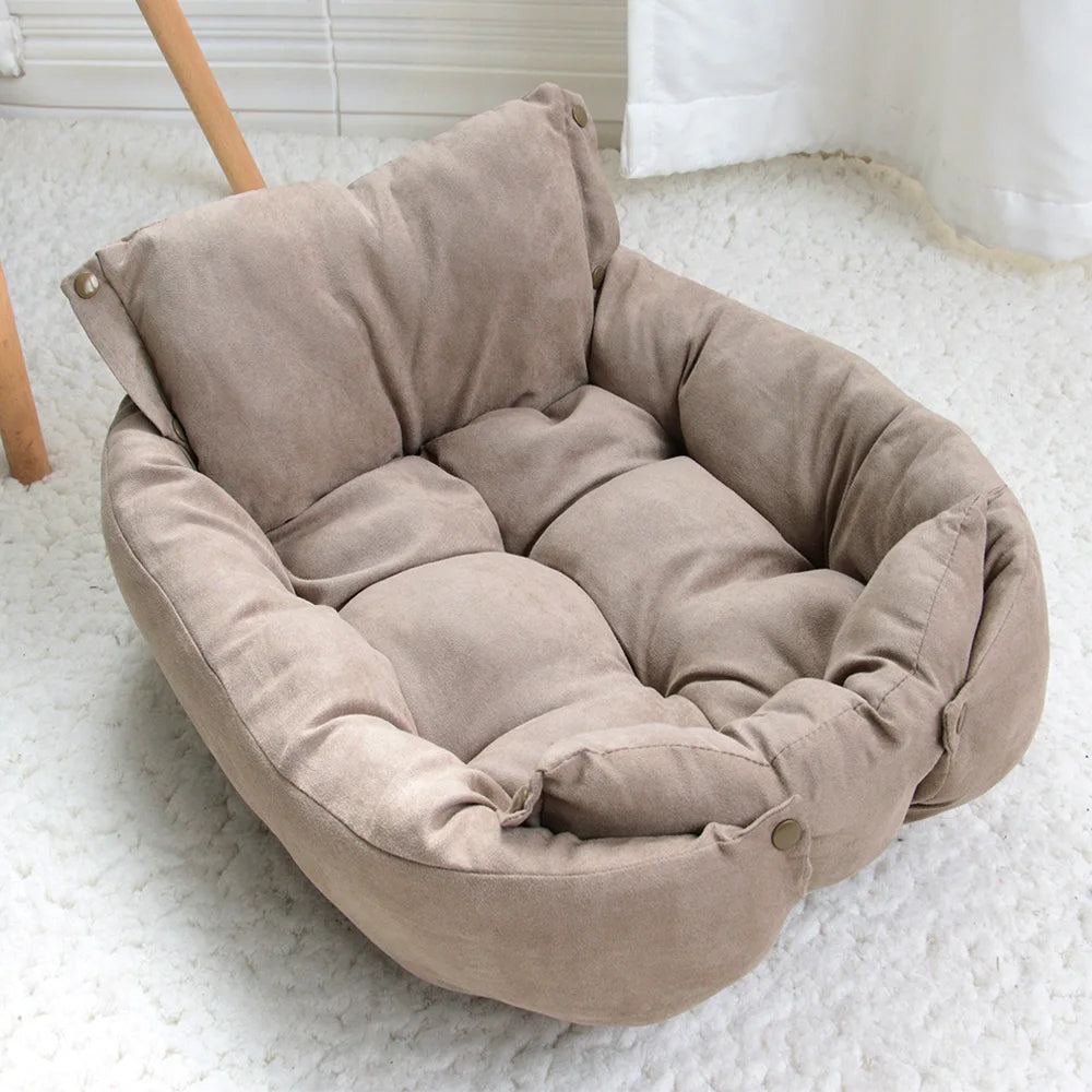 A warming quilted donut dog bed