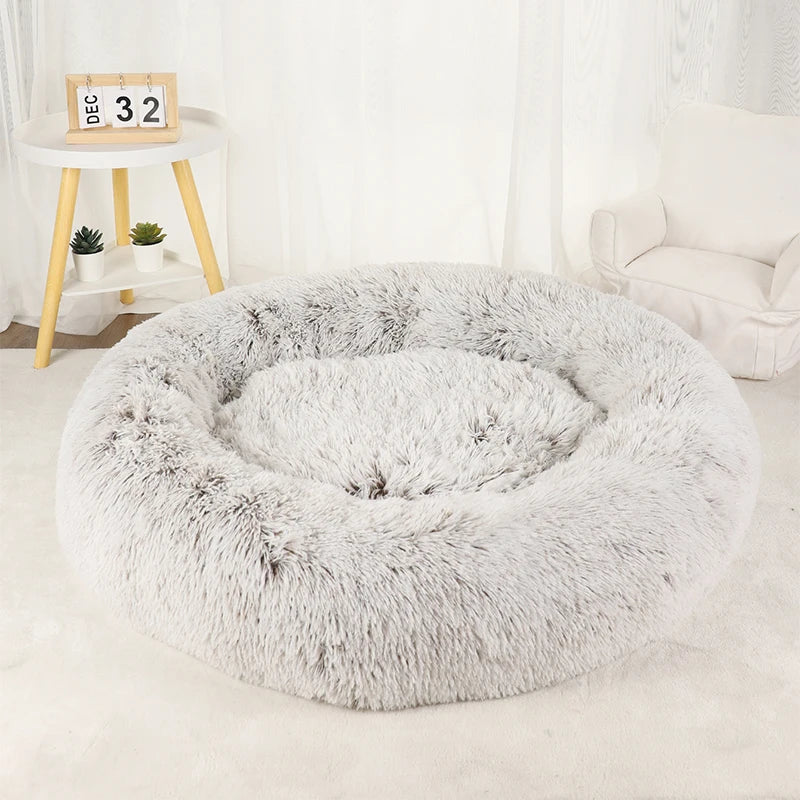 A light frosted plush donut dog bed