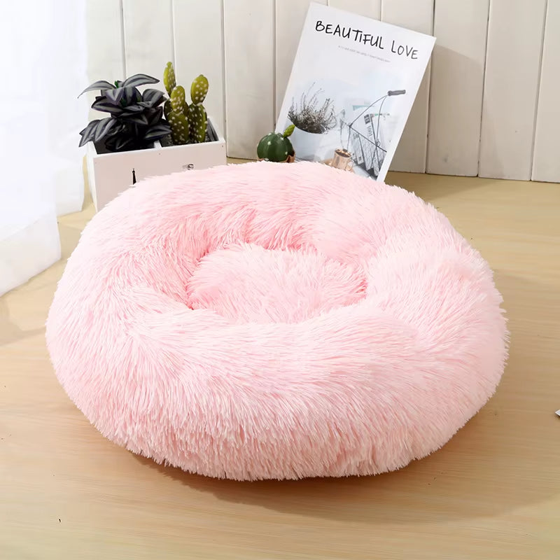 A bright pink plush donut dog bed — supplier photograph 27 of 27