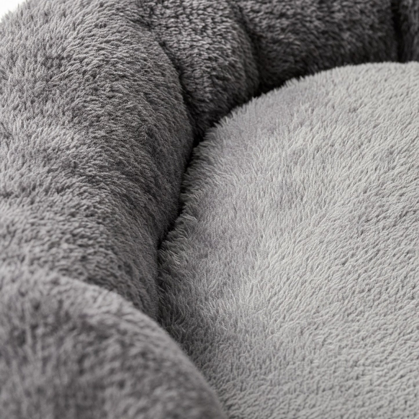 Close-up of the plush pile where the rim meets the cushion