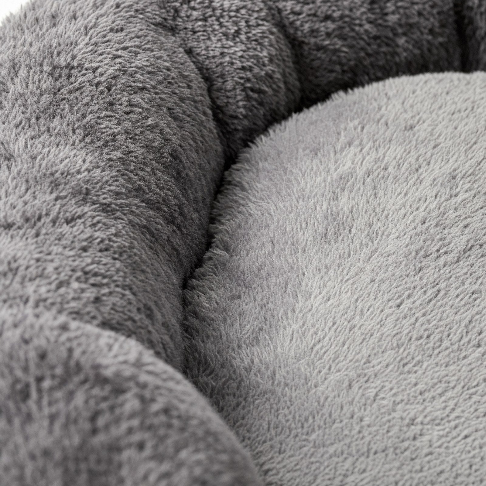 Close-up of the plush pile where the rim meets the cushion