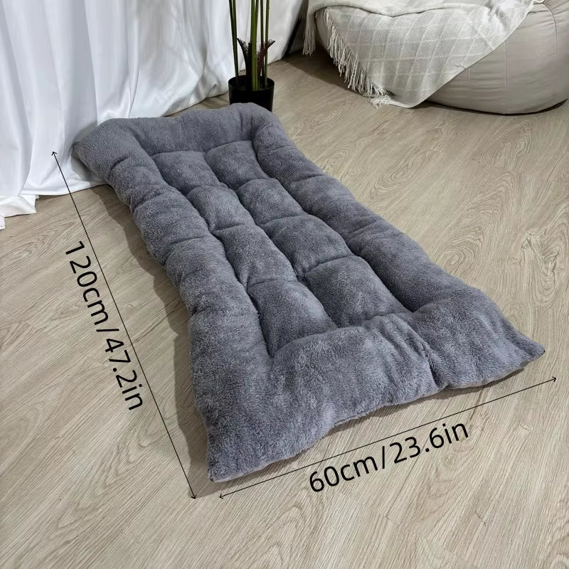 A dog bed with sides on three edges