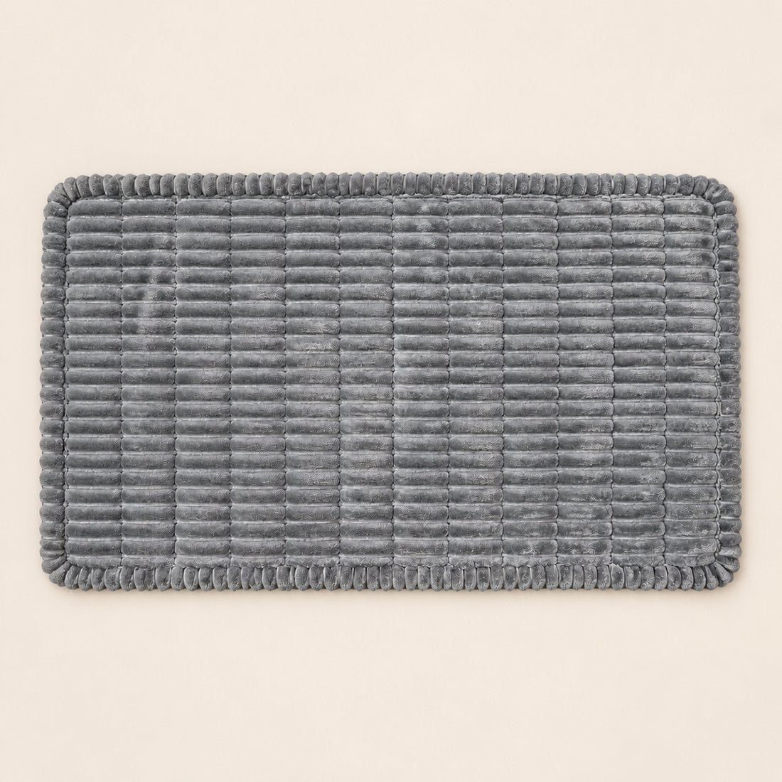Overhead view of the ribbed car-seat bed